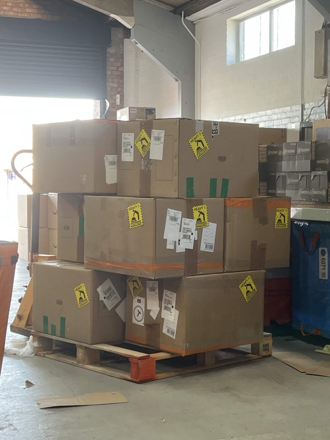 A completed pallet waiting by the loading bay door ready for dispatch